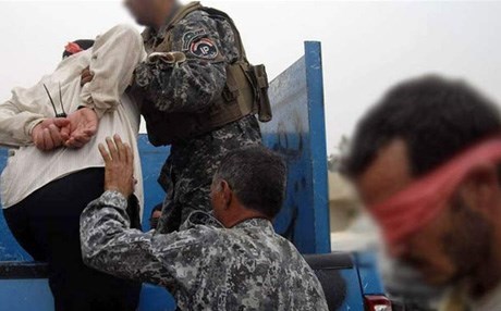 اعتقال متهمين القيا قنبلة على كشك للمواد الغذائية في بغداد
