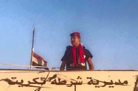 بالصور..رفع العلم العراقي على مبنى مديرية شرطة تكريت