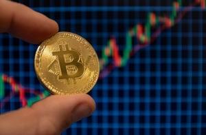 تراجع سعر "بتكوين" 7% لتصل إلى 56381 دولارا