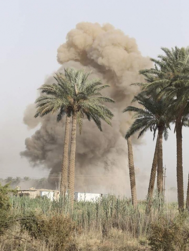 قتل 19 أرهابياً بتدمير سوق داعشي لبيع الاسلحة في غارة بالقائم