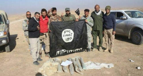 الحشد يدمر معسكراً لداعش ويقتل ثلاثة ارهابيين داخله في جبال حمرين